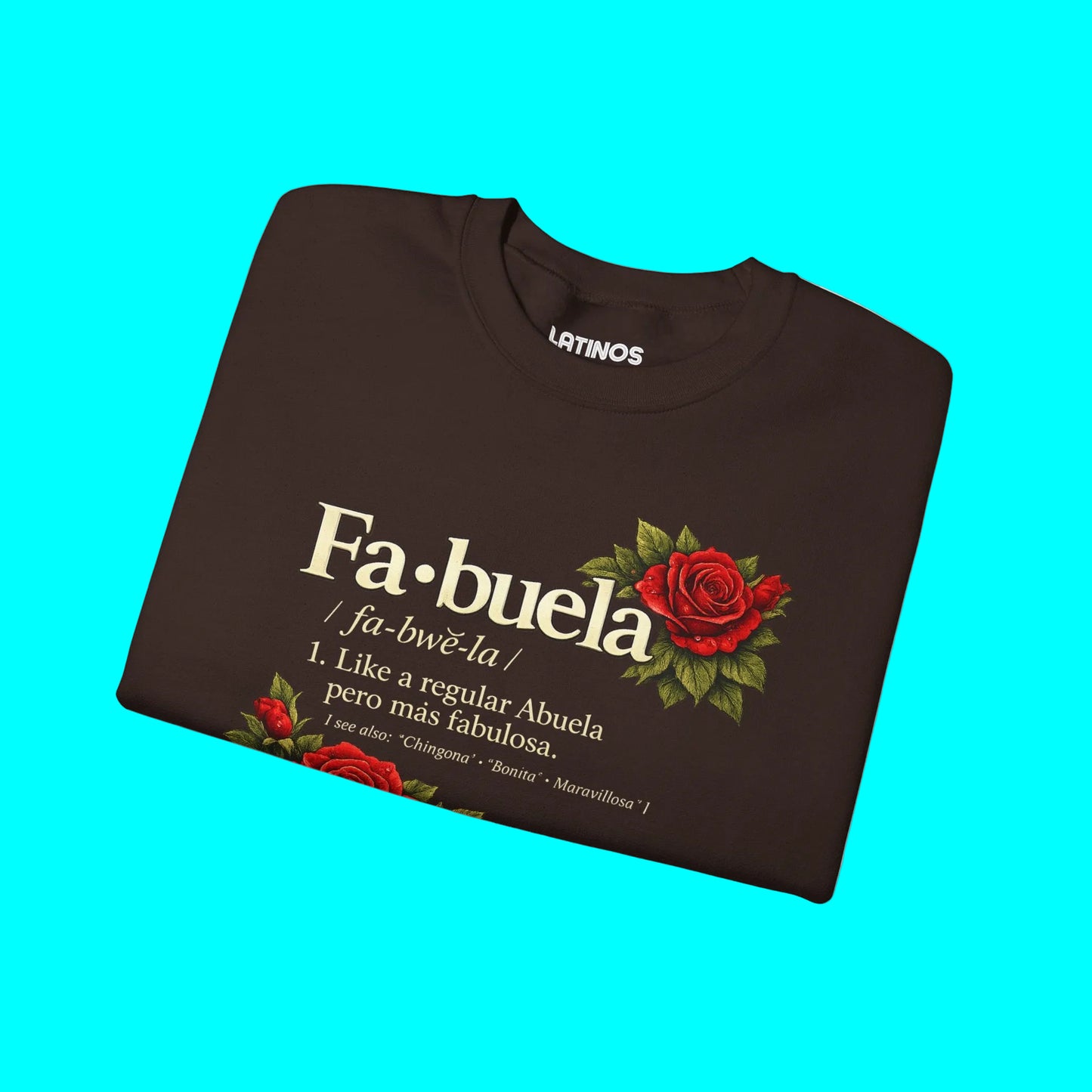 Folded brown sweatshirt with 'Fa-buela' text and rose design on a white background
