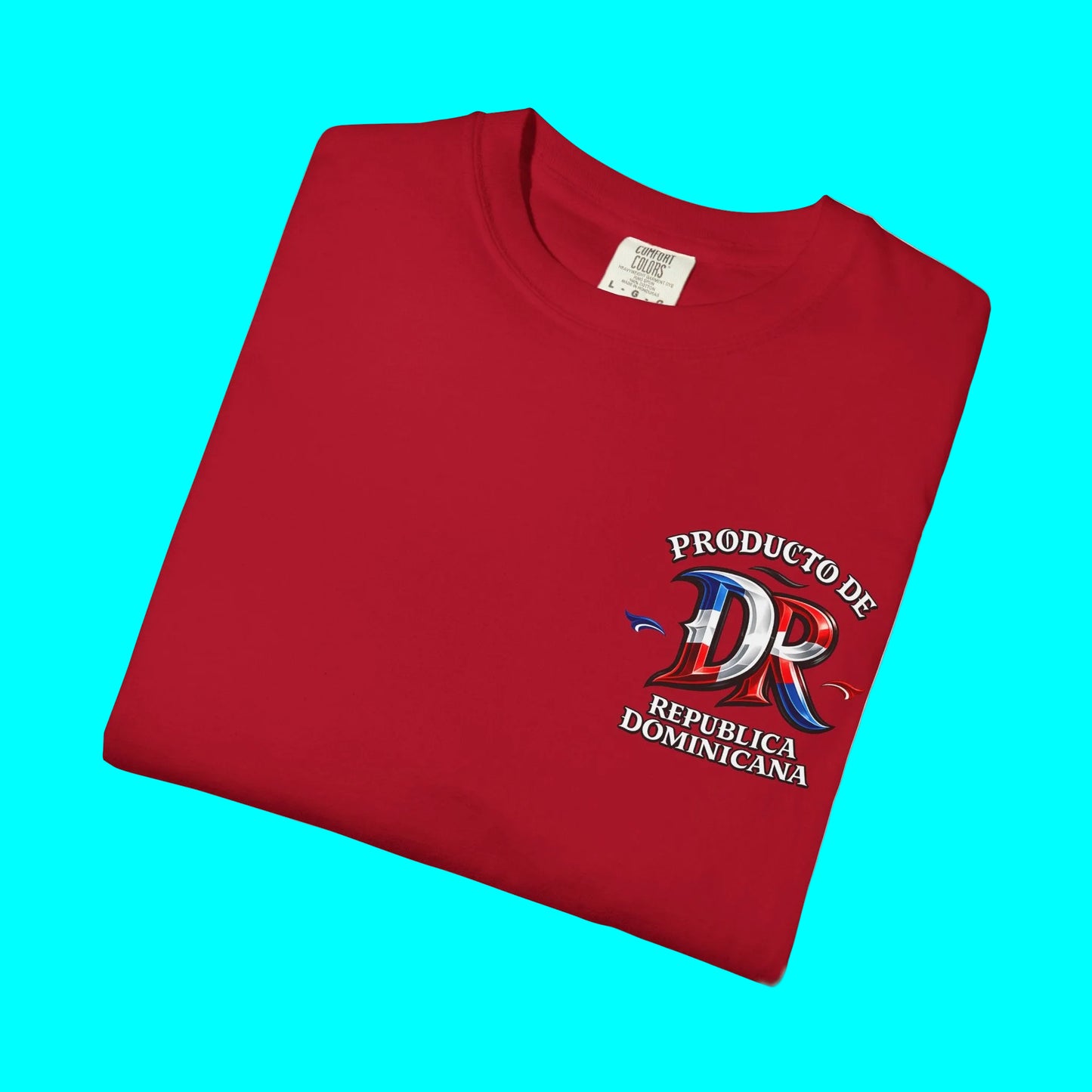 A folded red crewneck t-shirt with a graphic on the left chest featuring a white rose, a woman in a red dress, and the text 'Bloom Beyond Fear'.