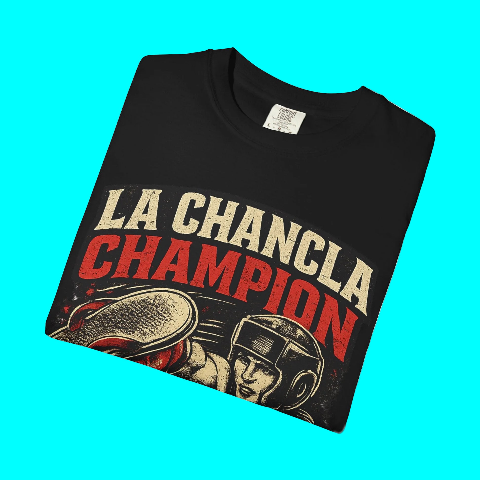 Black t-shirt with 'La Chancla Champion' text and graphic on a white background