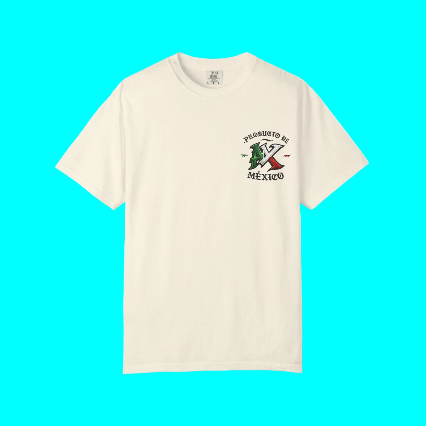 An off-white short-sleeve crewneck t-shirt with a small graphic on the left chest depicting a green and red Mexican flag with the text 'PRODUCTO DE MEXICO'.