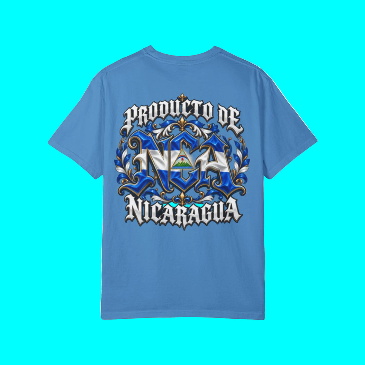 A blue short-sleeve t-shirt with a gothic-style graphic on the front reading 'PRODUCTO DE NICARAGUA' in white and black, decorated with blue and gold ornate flourishes and a small green-and-white flag motif in the center.