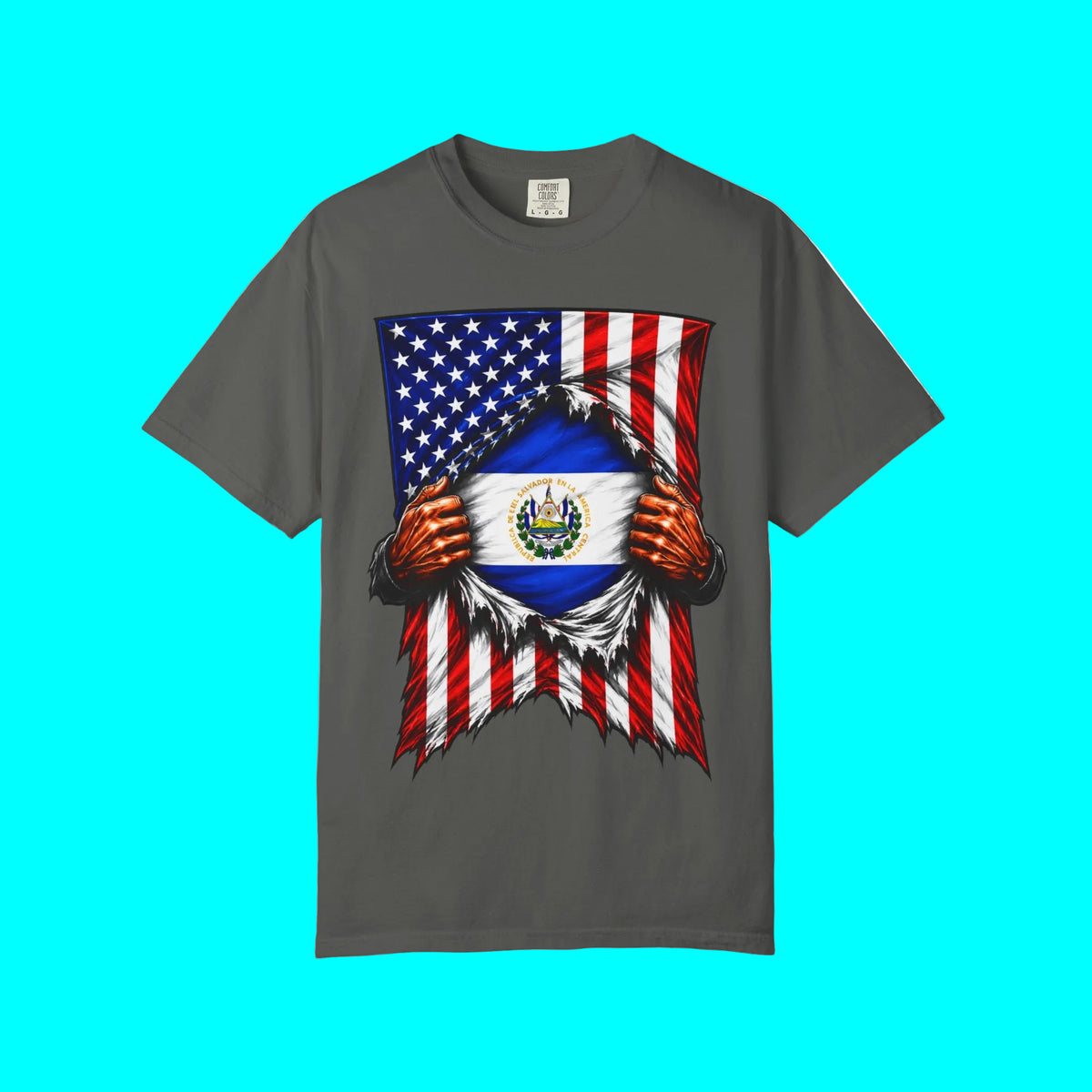 A dark gray short-sleeve t-shirt with a graphic print of the United States flag being ripped open to reveal the flag of El Salvador underneath, set against a plain white background.