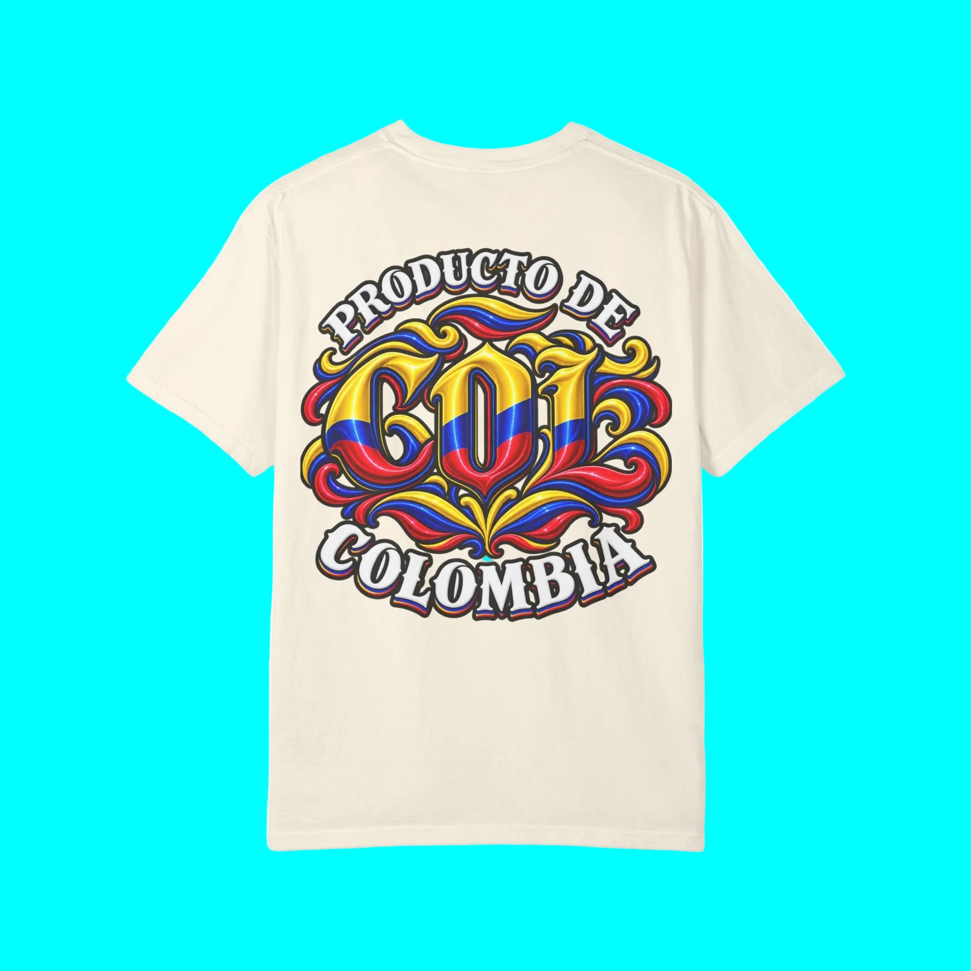 An off-white short-sleeve t-shirt with a colorful graphic on the front reading 'PRODUCTO DE COLOMBIA' around stylized 'COLM' lettering with Colombian flag colors.