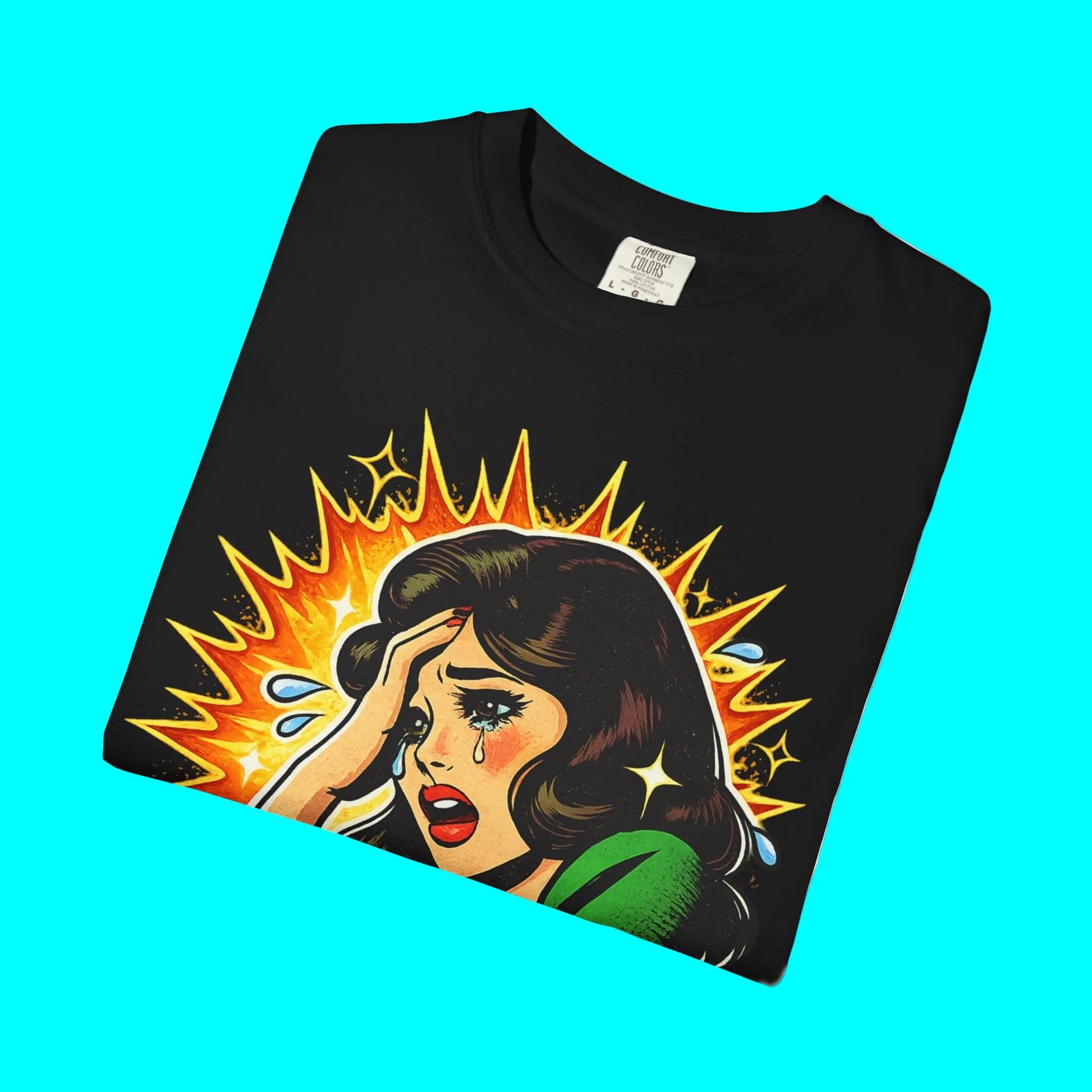Black t-shirt with a colorful graphic of a woman with an explosion background on a white background