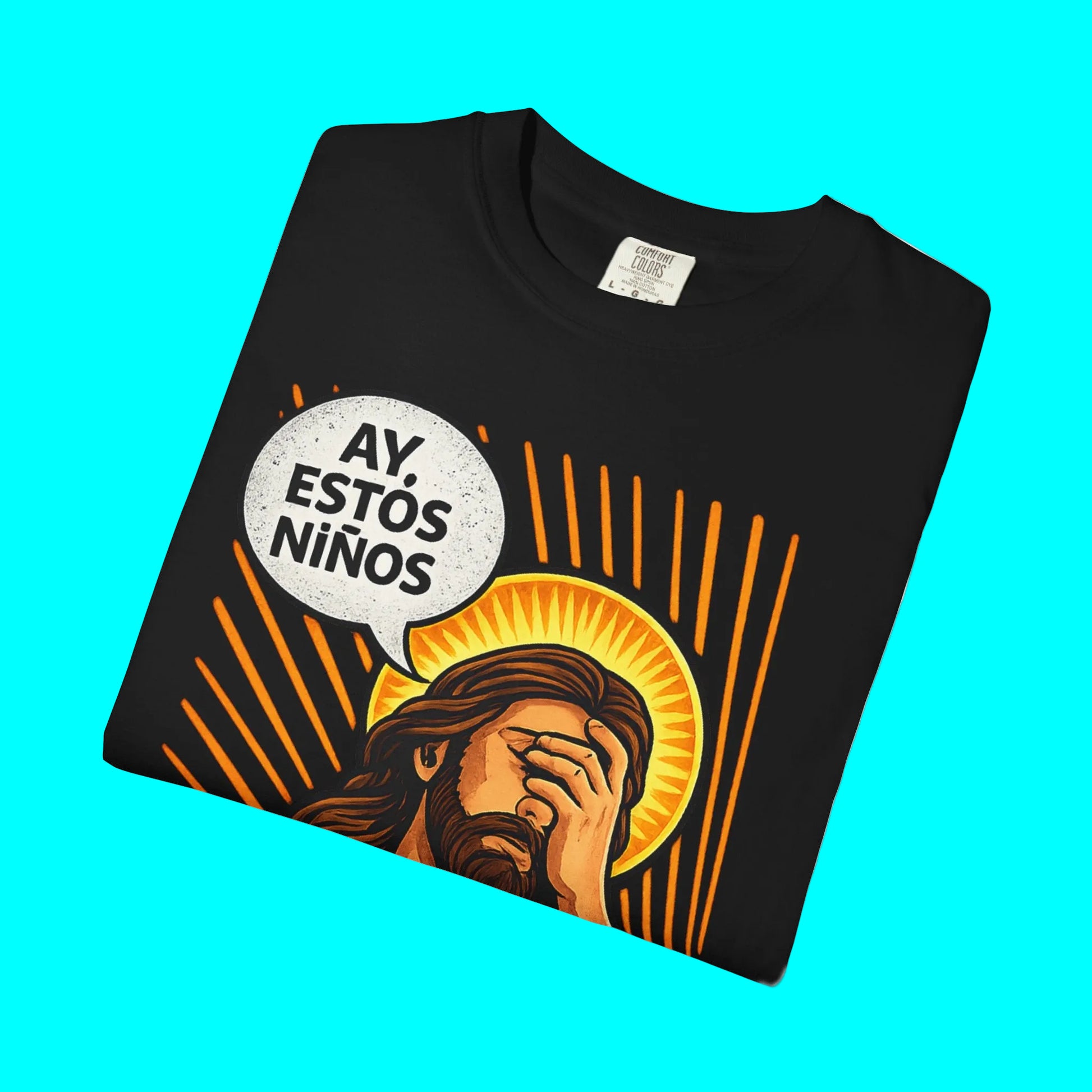 Black t-shirt with graphic design of a face with a speech bubble and a halo, on a white background