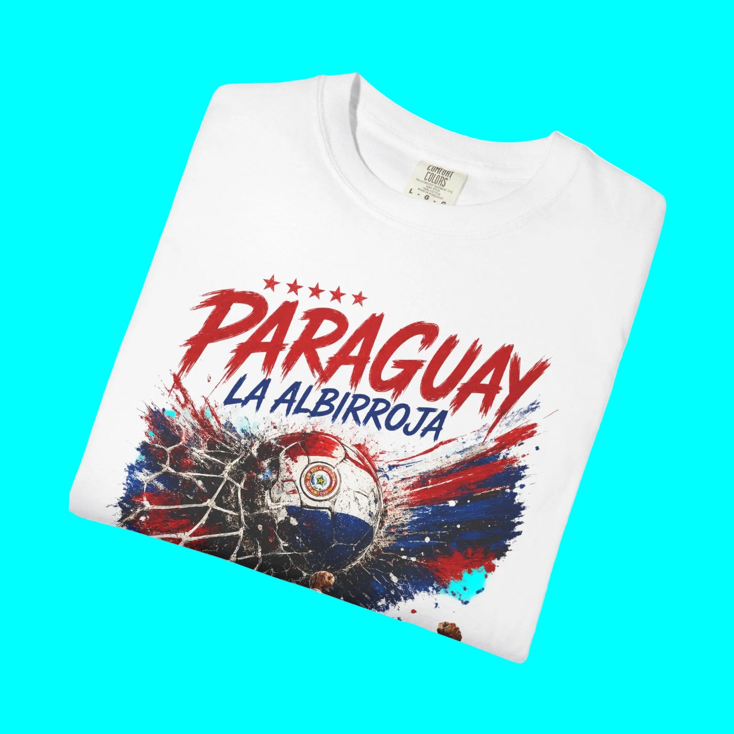 White t-shirt with 'Paraguay La Albirroja' text and colorful design on a white background