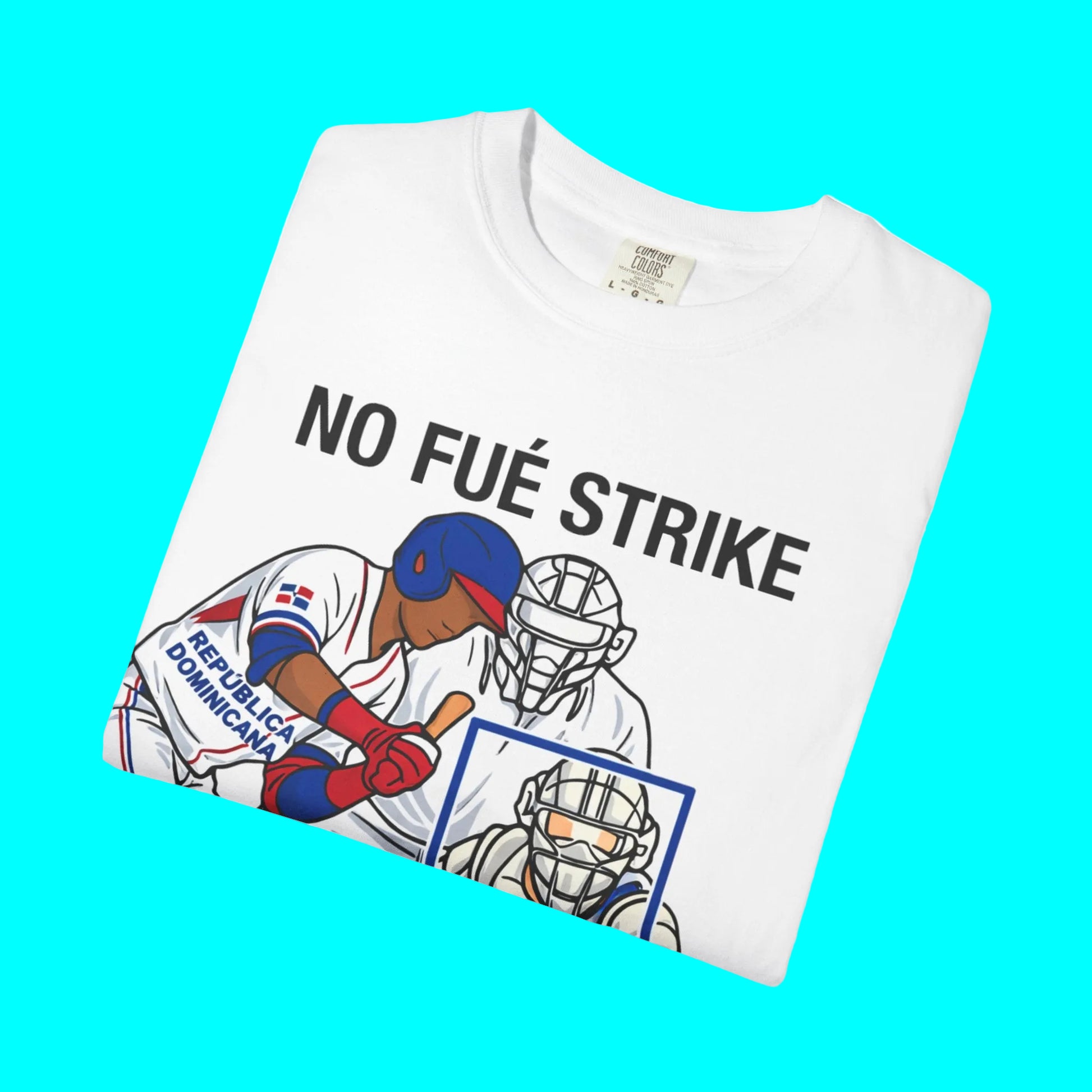 White t-shirt with graphic of baseball players and 'NO FUÓ STRIKE' text on a white background