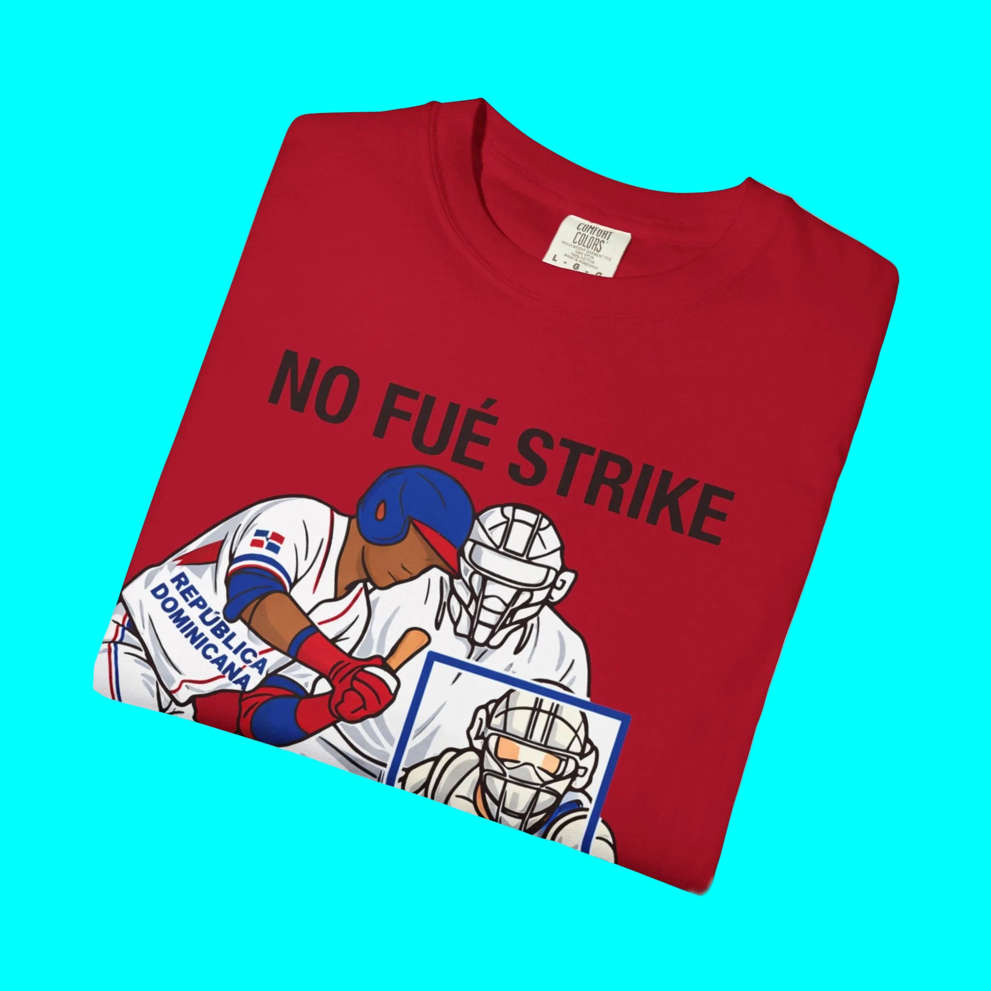 Folded red t-shirt with graphic design and text on a white background