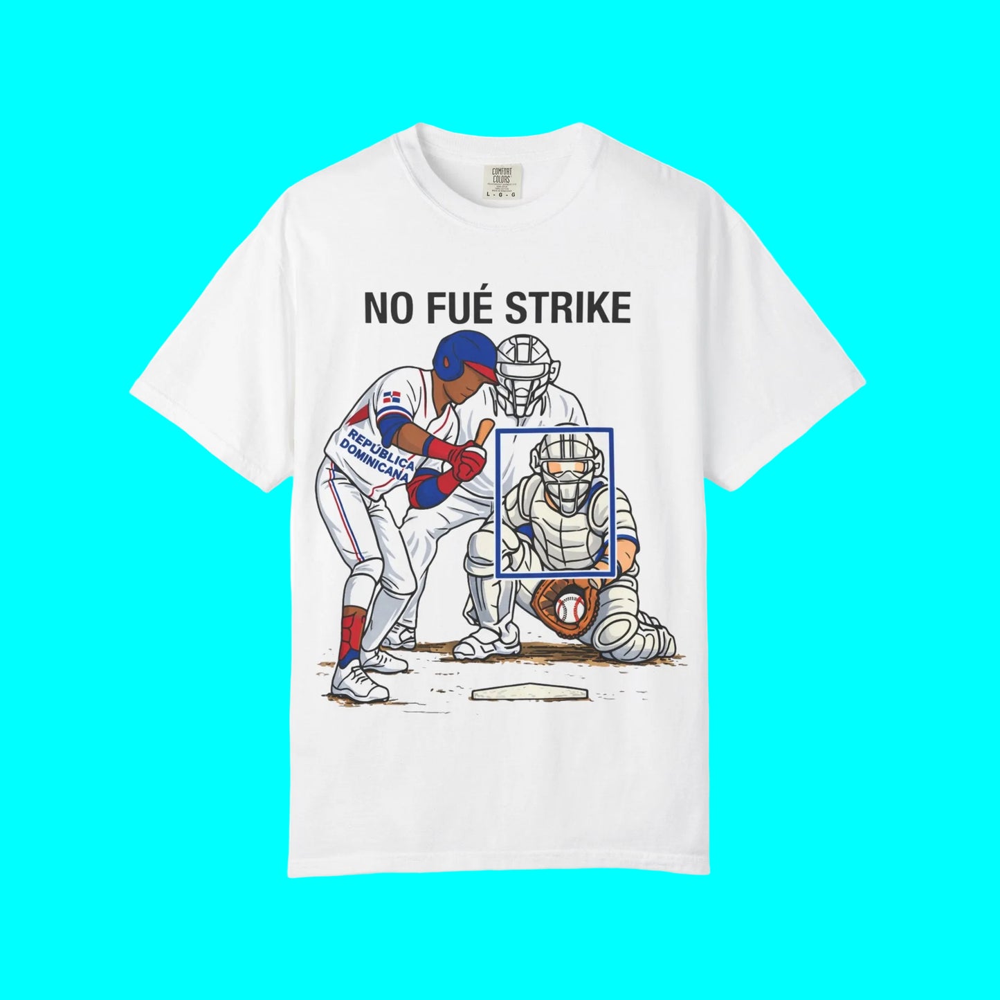White t-shirt with a graphic of a baseball player and catcher and text 'NO FUE STRIKE' on a white background.
