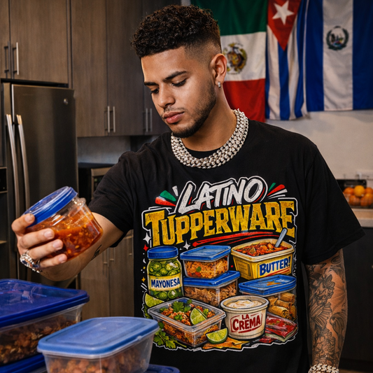 Person in a kitchen holding a container of food, wearing a 'Latino Tupperware' shirt.